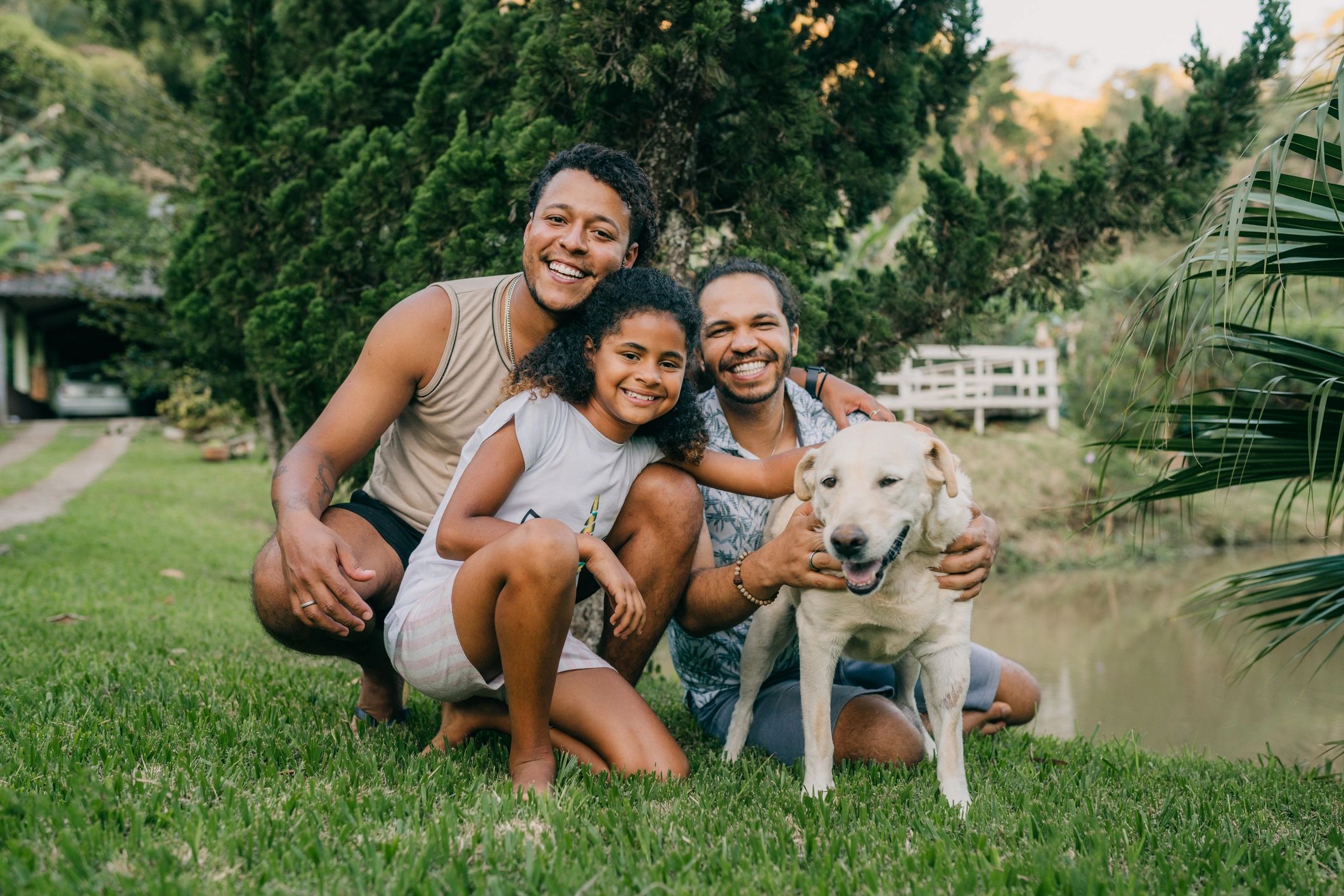 Family with a dog in the backyard